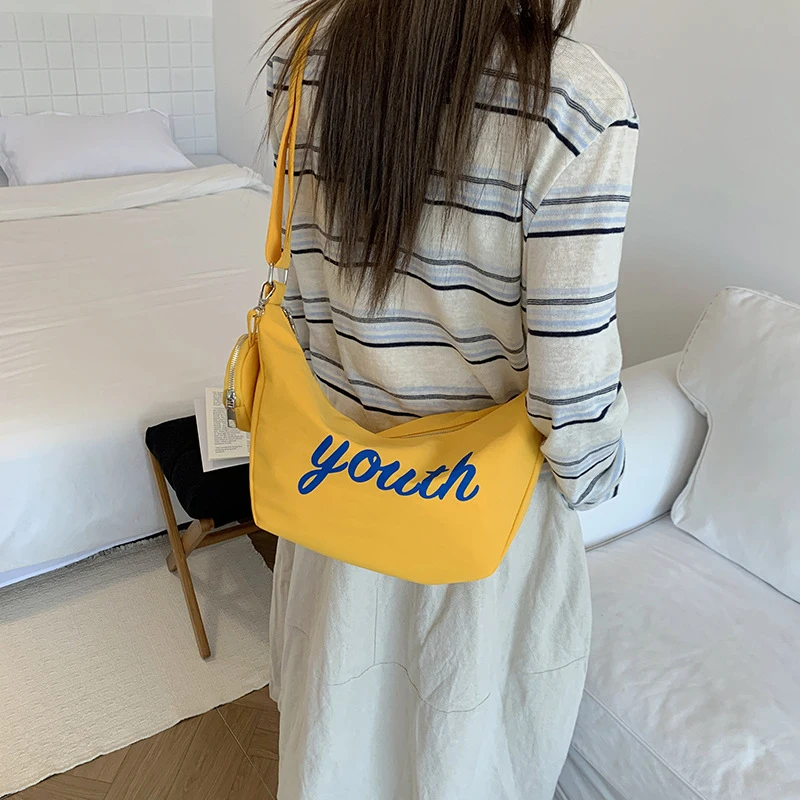 

2026 New Korean Style Nylon Letter Printed Crossbody Bag Casual Dumpling Double Compartment Shoulder Bag