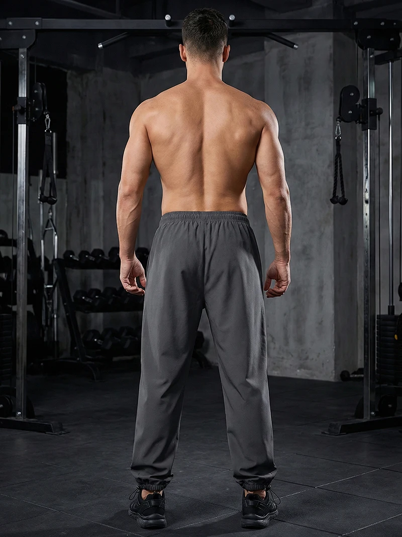 Trendige, sportliche Herrenhose mit Linien, Fitnessstudio, Workout, Laufhose mit Seitentaschen, sportliche, schnell trocknende, atmungsaktive Jogginghose – Detail 29