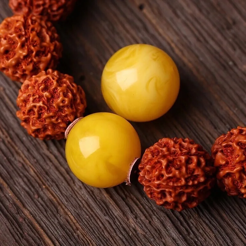 

, round bead, single piece, chicken fat yellow old amber with exotic patterns, bracelet beads, Vajra, Star and
