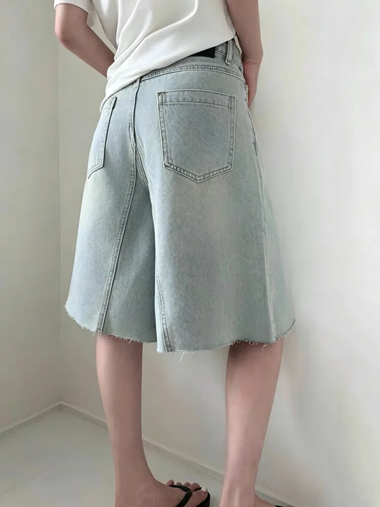 Retro washed light blue fringed denim capri pants for women - high-waisted with patch design and wide-leg style. 2026 new design
