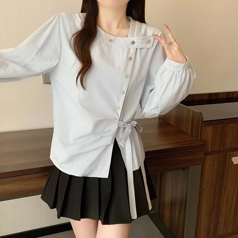 Femme Primavera Estate Tendenza moda coreana Bottoni Tinta unita O-Collo Camicie da donna Pullover a maniche lunghe con coulisse alla moda