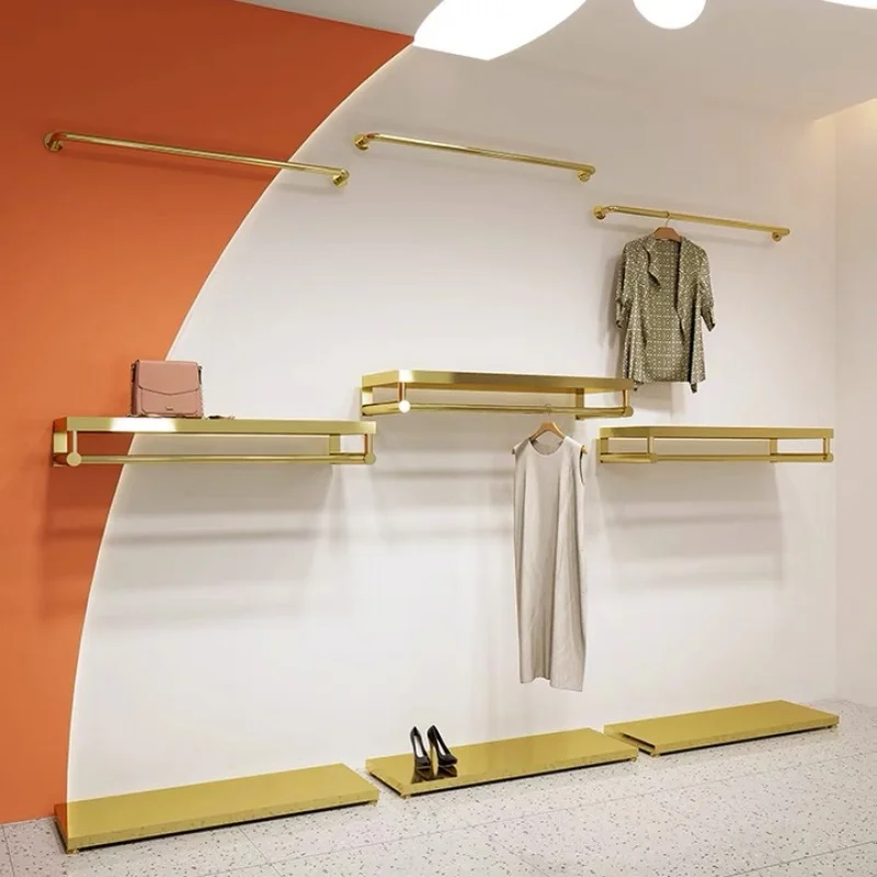 

Custom High end customized new style wall mounted stainless steel gold hanging clothes shelf for women's clothing store