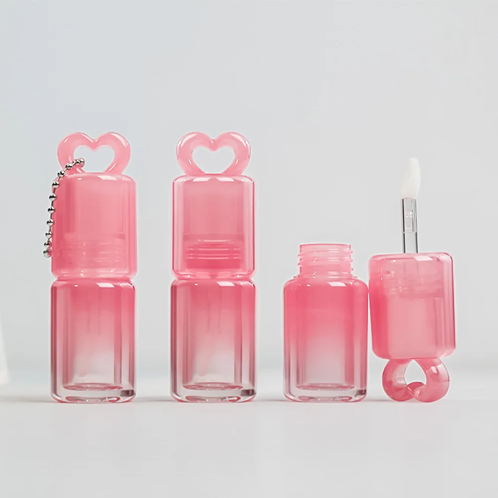 ハート型のグラデーションカラーリップグロスチューブ、大きなワンドブラシ付きリップオイルボトル、空のリップグロスチューブ、リップスティックボトル容器