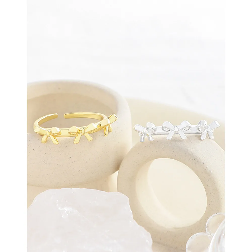 

Корейское серебряное кольцо INS с бантом - стерлинговое серебро S925 с микро-паве цирконом (женское)