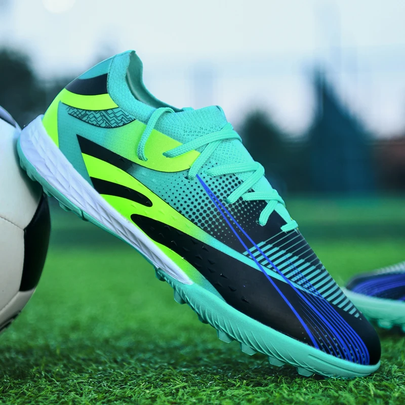 Children's durable football shoes with perforated patterns suitable for all seasons. Comfortable and lightweight. HX-X809-1