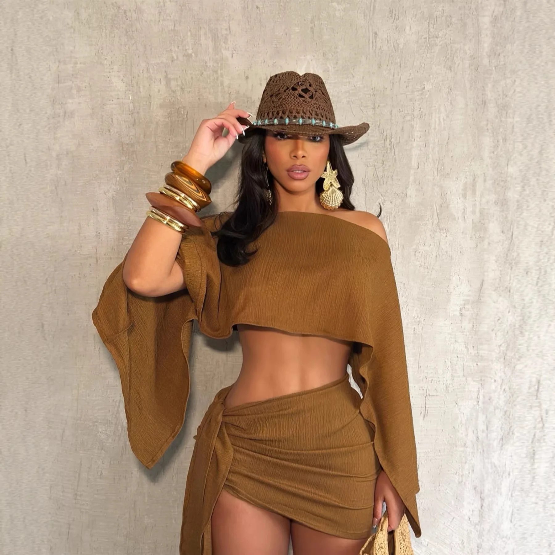 

Stylish Elegant and Sexy Beach Vacation Style Set Off-the-shoulder Top with A One-shoulder Neckline and A Tie-up Bodycon Skirt