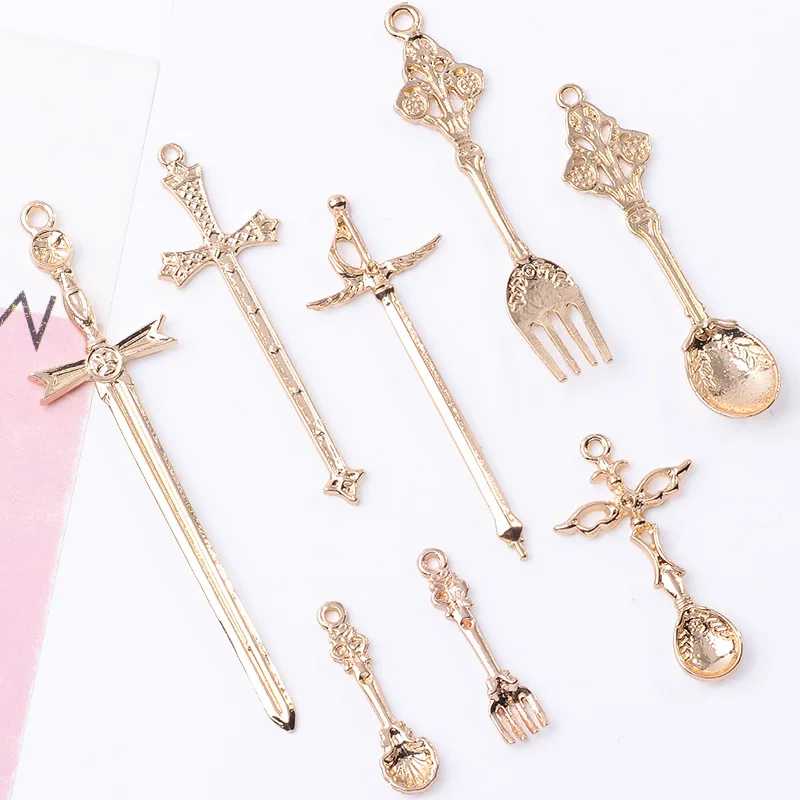 

100Pcs sets personalized punk accessories DIY handmade long earrings tassel cross longsword court spoon fork pendant