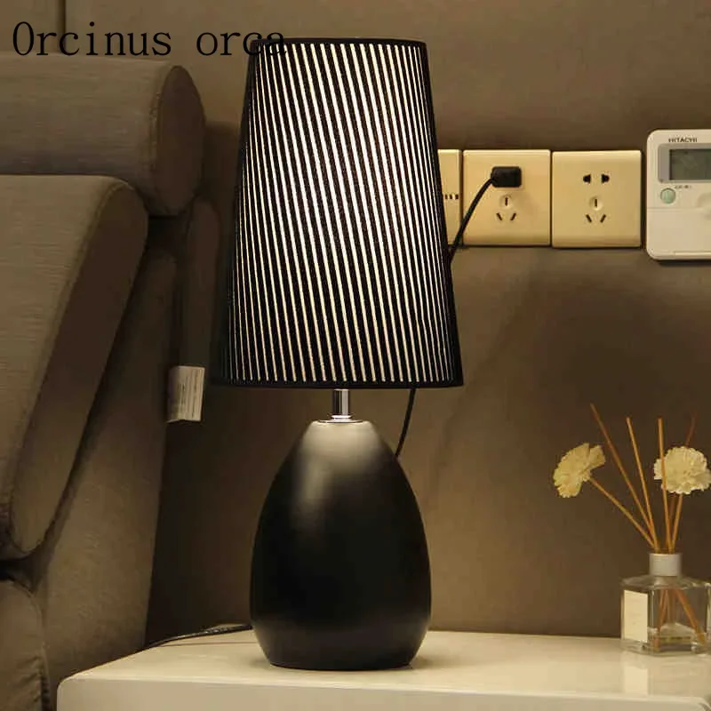 

The bedroom lamp creative minimalist modern European fashion Nordic warm decorative small bedside lamp