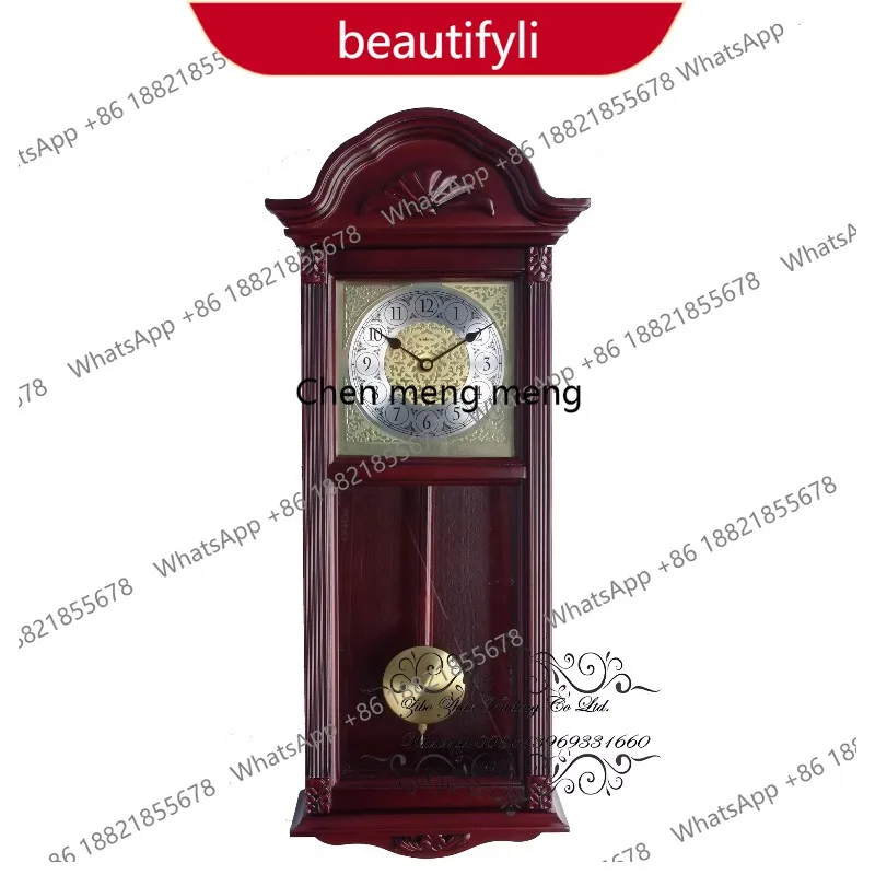 The pendulum wooden wall clock is a great timepiece with black numerals and a brass bezel a55
