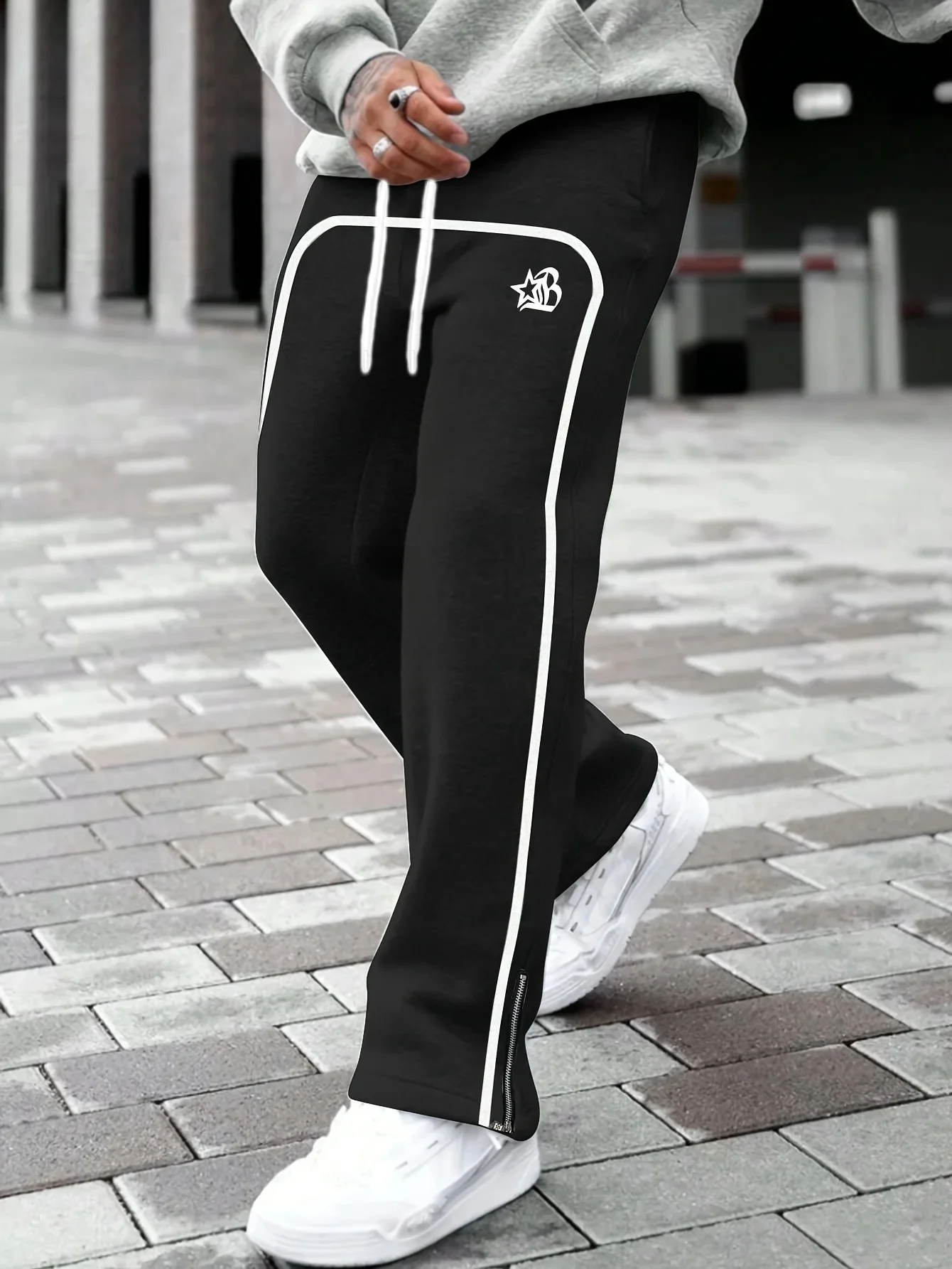2026 Sommer Neuer Trend Herren Loose-Fit Schnelltrocknende Hose Schwarz-Weiß mit Piping und Stern-B-Print Hip-Hop Street Fashion Hose für den Alltag