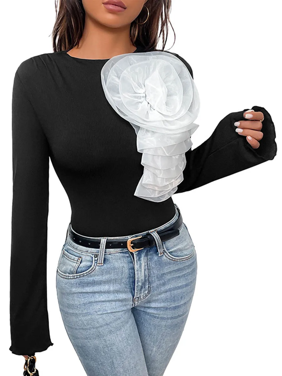 

Black womens jumpsuit with long sleeves ribbed fabric and ornamental three dimensional flowers suitable for spring and summer