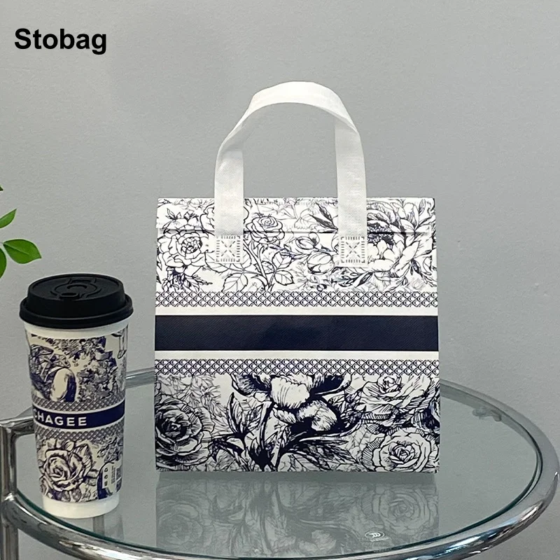 

StoBag 10pcs White Flower Non-woven Insulation Tote Bag Fabric for Bread Drink Food Packaging Keep Warm Cold Delivery Pouches