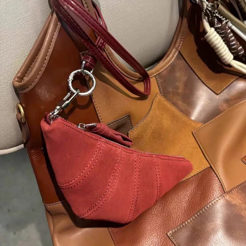 Bolsas de couro genuíno Mini para mulheres bolsas e bolsas de designer de luxo 2024 novo em couro de vaca vintage emenda design moeda bolsa chave pingente bolsa de ombro alta qualidade Frete grátis Envio rápido chega