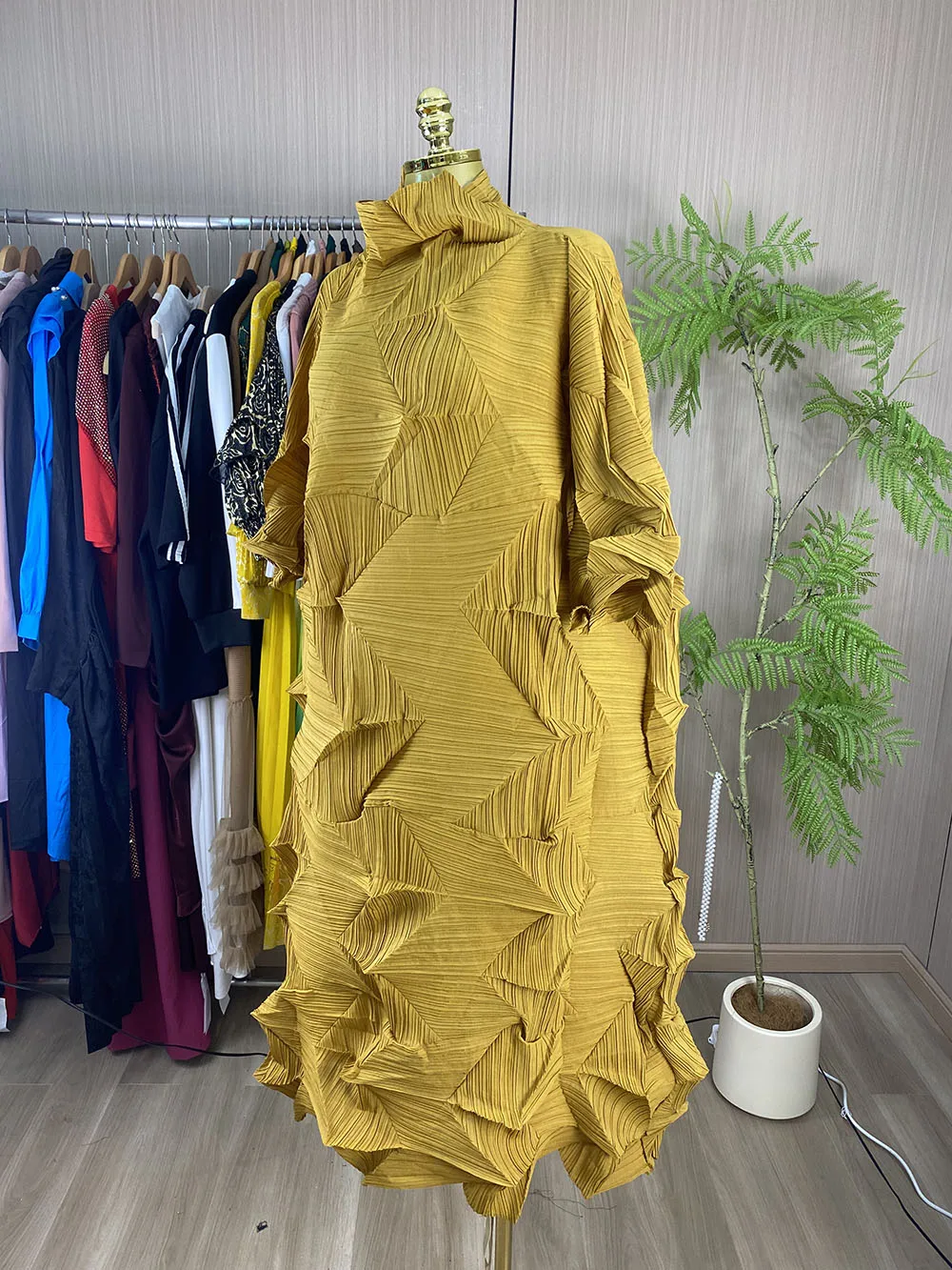 Women's casual, loose-fit, plus-size asymmetrical dress featuring a stylish, unique pleated design and a waist belt.-GZXX1148