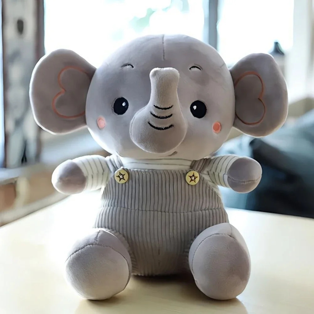 

22CM Cute Overalls Elephant Plush Toy Sitting Posture Drag Baby Elephant Long Nose Doll Birthday Gift For Children And Friends