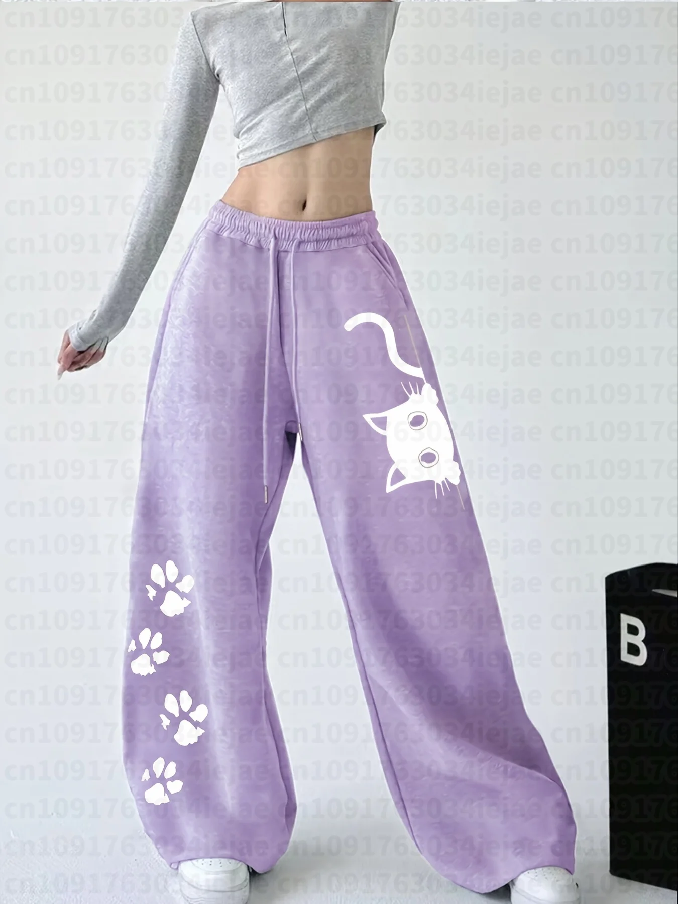 Lässige Jogginghose für Damen und Kinder mit lustigem Katzen-Print und elastischem Bund mit Kordelzug, gerade geschnitten. – Detail 5