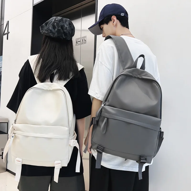 Mochila de piel sintética para hombre y mujer, bolso de viaje de gran capacidad, diseño clásico, color blanco y negro