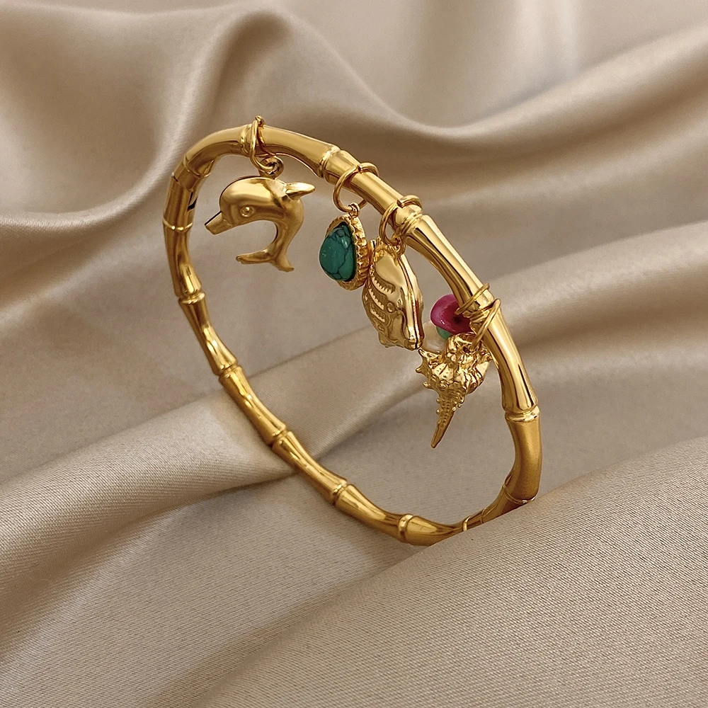 

Freetry Bohemian Stainless Steel Starfish Conch Dolphin Pendant Bracelet for Women Waterproof Smooth Open Spring Buckle Bangle