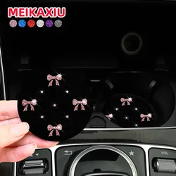 A pair of bow glitter Blingbling water coasters waterproof non-slip car water cup holder car interior accessories for women