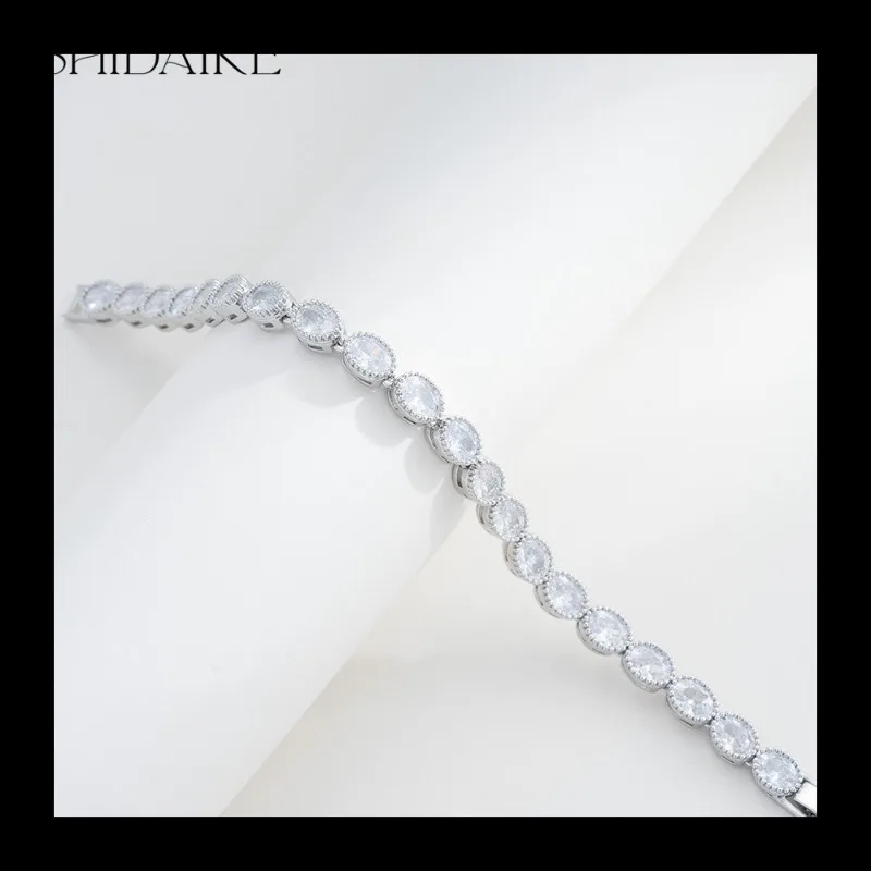 

Times Guest Взрывной браслет Ювелирные изделия Овальный браслет с инкрустацией цирконом Атмосферный браслет, прямые волосы