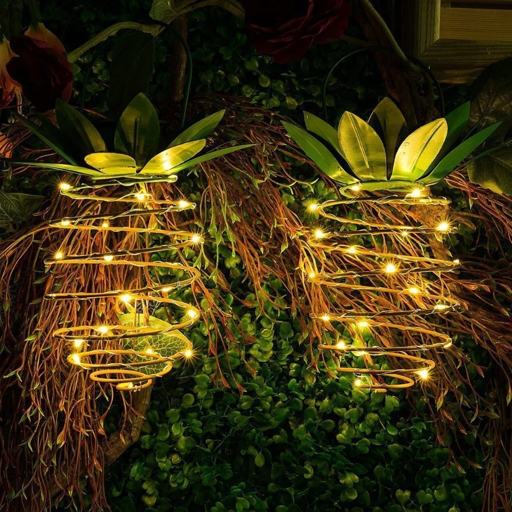 Lanterna solare per lampada solare in filo di rame con luce solare per ananas in ferro battuto da 24 LED per esterni