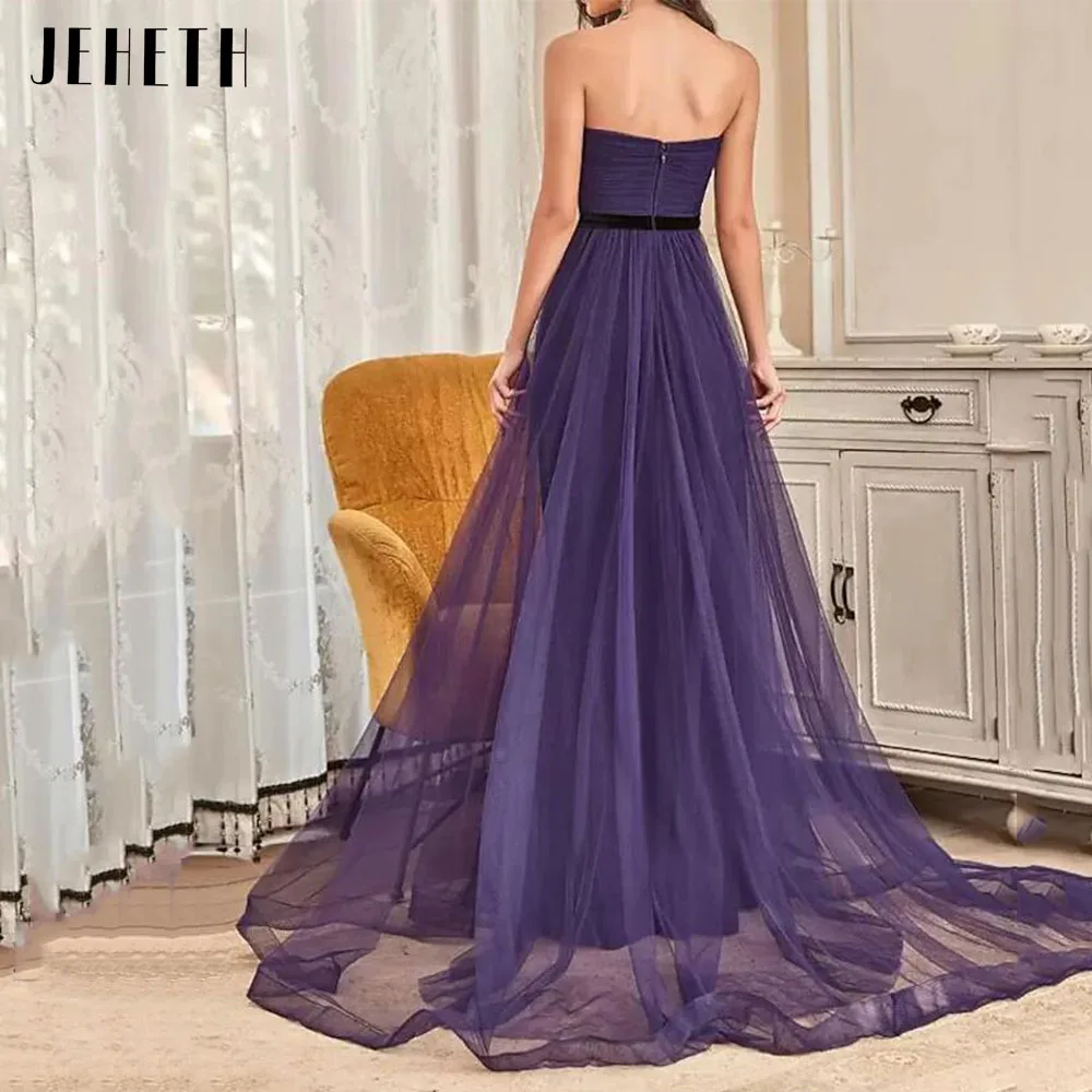 JEHETH Viola Elegante A-Line Sera Abiti formali senza spaJEHETH viola elegante a-line abiti da cerimonia da sera senza spalline in Tulle con spacco laterale senza spalline con nastro nero abito da ballo increspato 2023