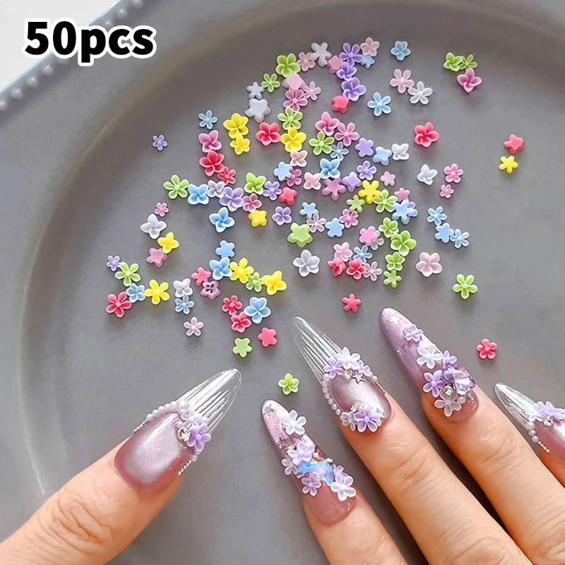 50Pcs สีสัน Frangipani เล็บ Charms 3D ห้ากลีบดอกไม้ตกแต่งสําหรับ DIY กดบนเล็บเล็บ Embellishments