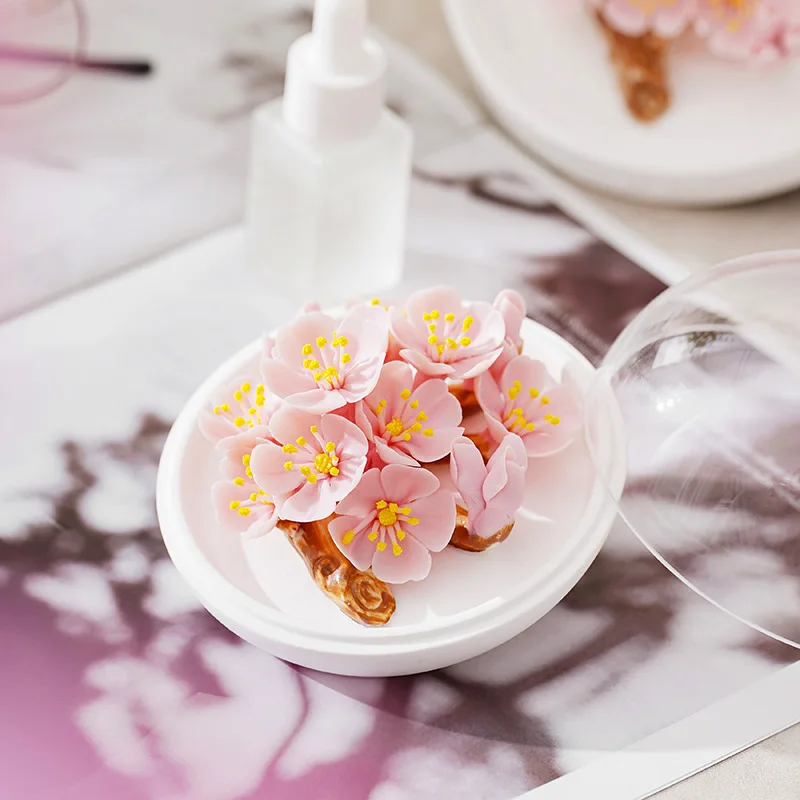 

New Year's osmanthus ceramics hand pinched fireless aromatherapy Dehua intangible cultural heritage craftsmanship