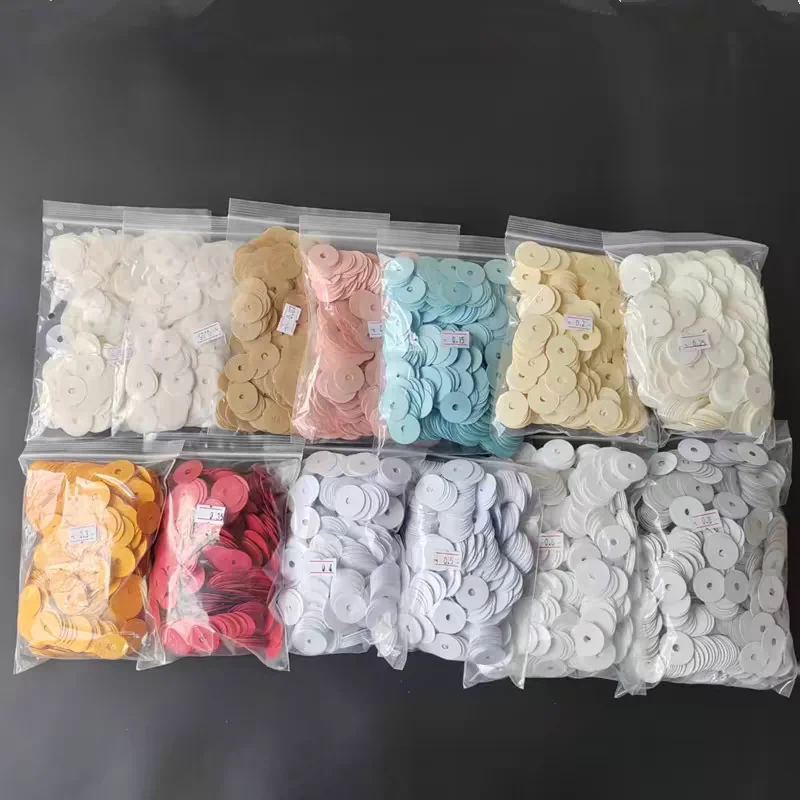Piano accessories washers, key washers, paper washers, there are 1000 paper washers per pack.