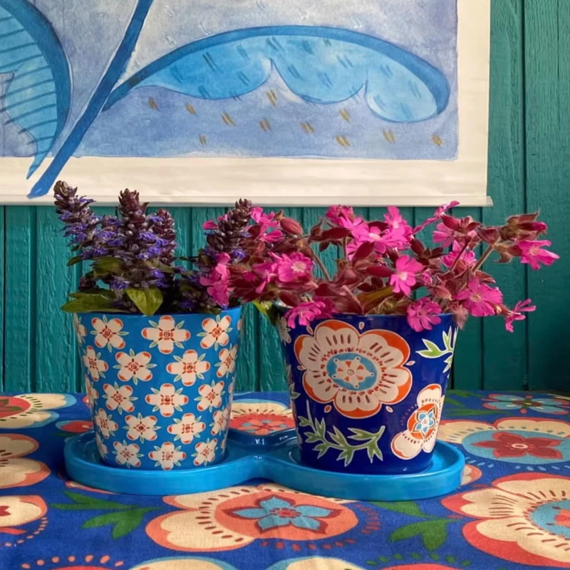 

Hand painted floral pattern ceramic three-piece vase