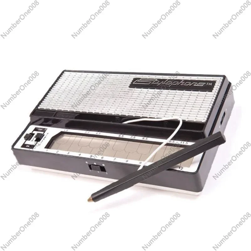 Stylophone portable pocket electronic instrument synthesizer mini keyboard piano arrangement music production equipment