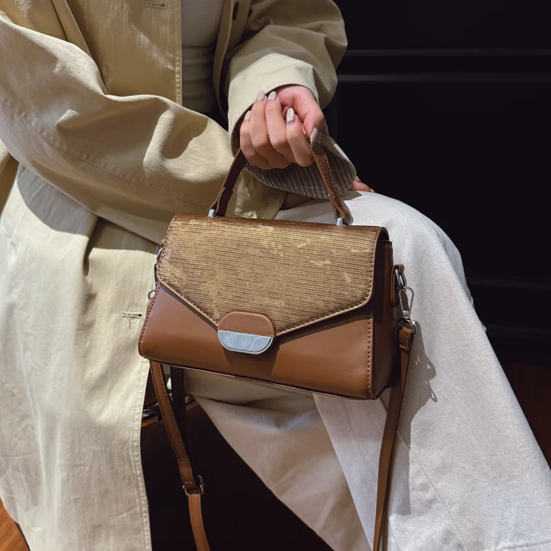 2025 ニッチクロスボディバッグ、ミニマリスト通勤用レディースバッグ、シックなトップハンドルトート、多用途デイナイトバッグ、テクスチャードスリング