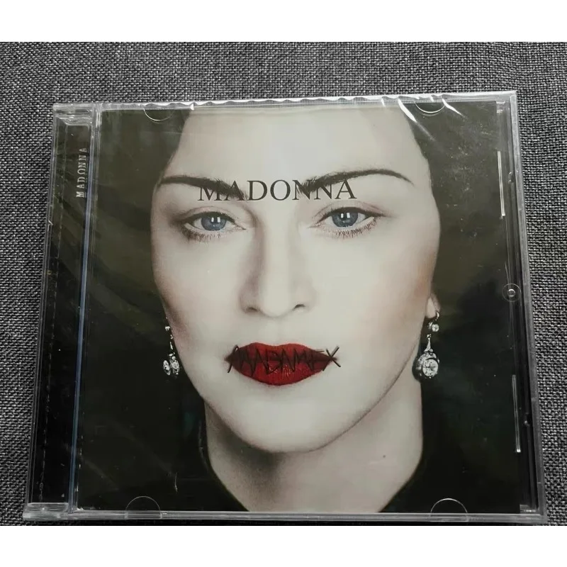

Поп-музыка: Мадонна, альбом Madame X, CD, оригинальные саундтреки, музыкальные учебные пособия, коллекционные предметы и сувениры
