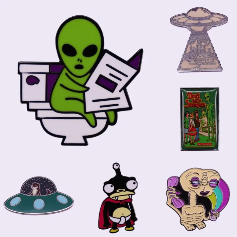 UFO Enamel Pins Custom Strange Alien Read The Newspaper Brooch Lapel Badges Backpack Cartoon  Jewelry Gift For Friends Wholesale