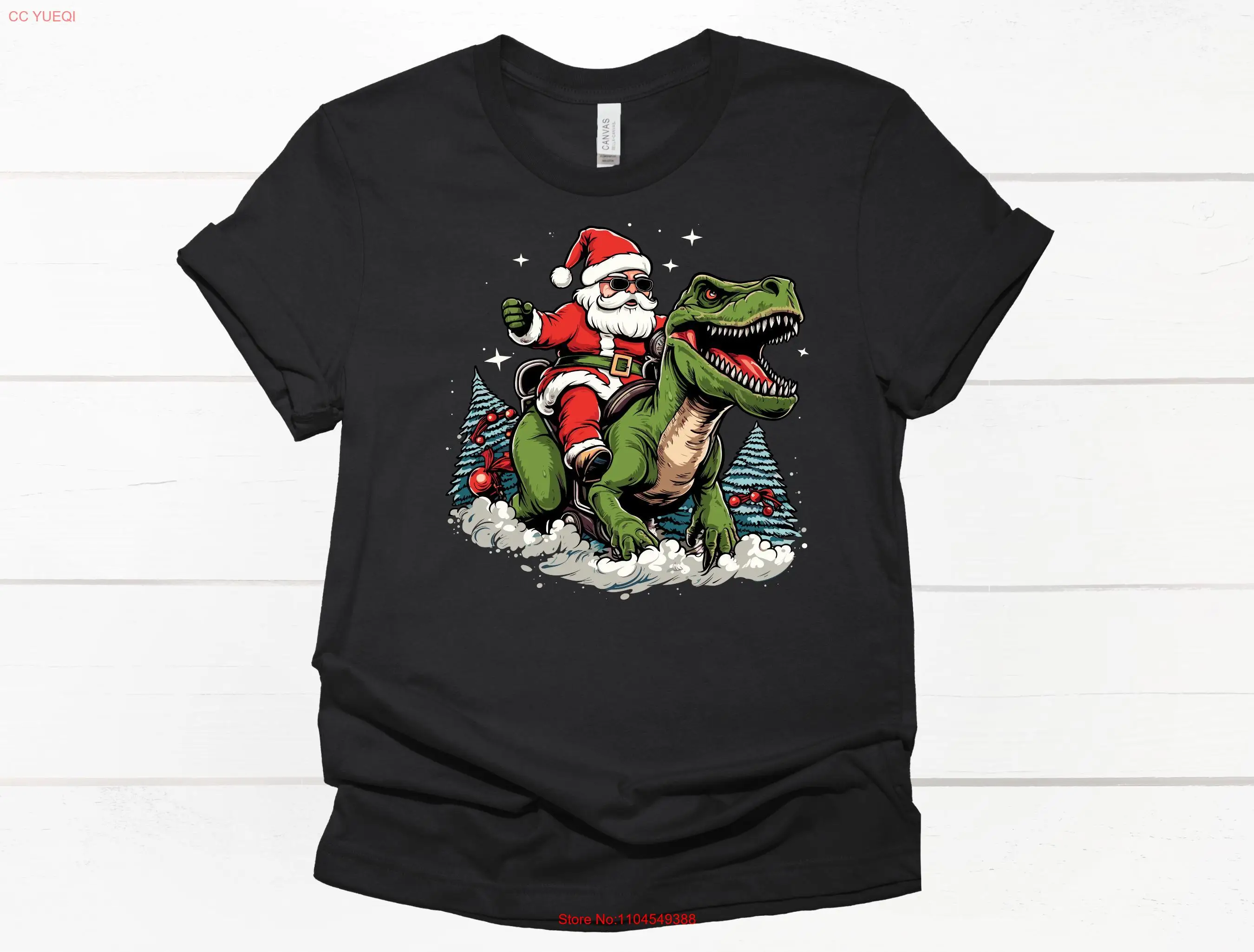 

Christmas Santa Riding T Rex Shirt Holiday Claus Funny Xmas for Dinosaur Lovers Festive Apparel long or short sleeves