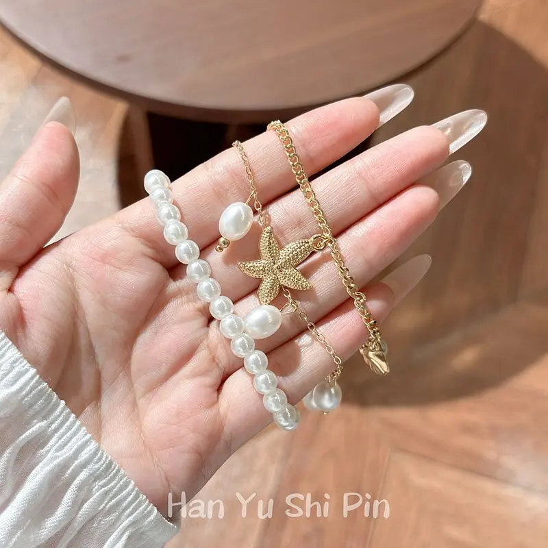 New seaside beach vacation style starfish and shell pendant bracelet for women, fashionable multi-layer stacked faux pearl jewel