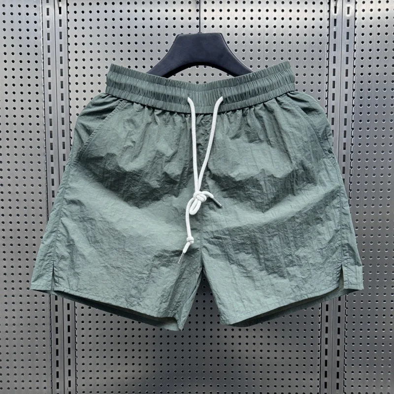 2025 summer thin ice silk shorts, loose and fashionable casual three part pants, drawstring men's solid color beach pants