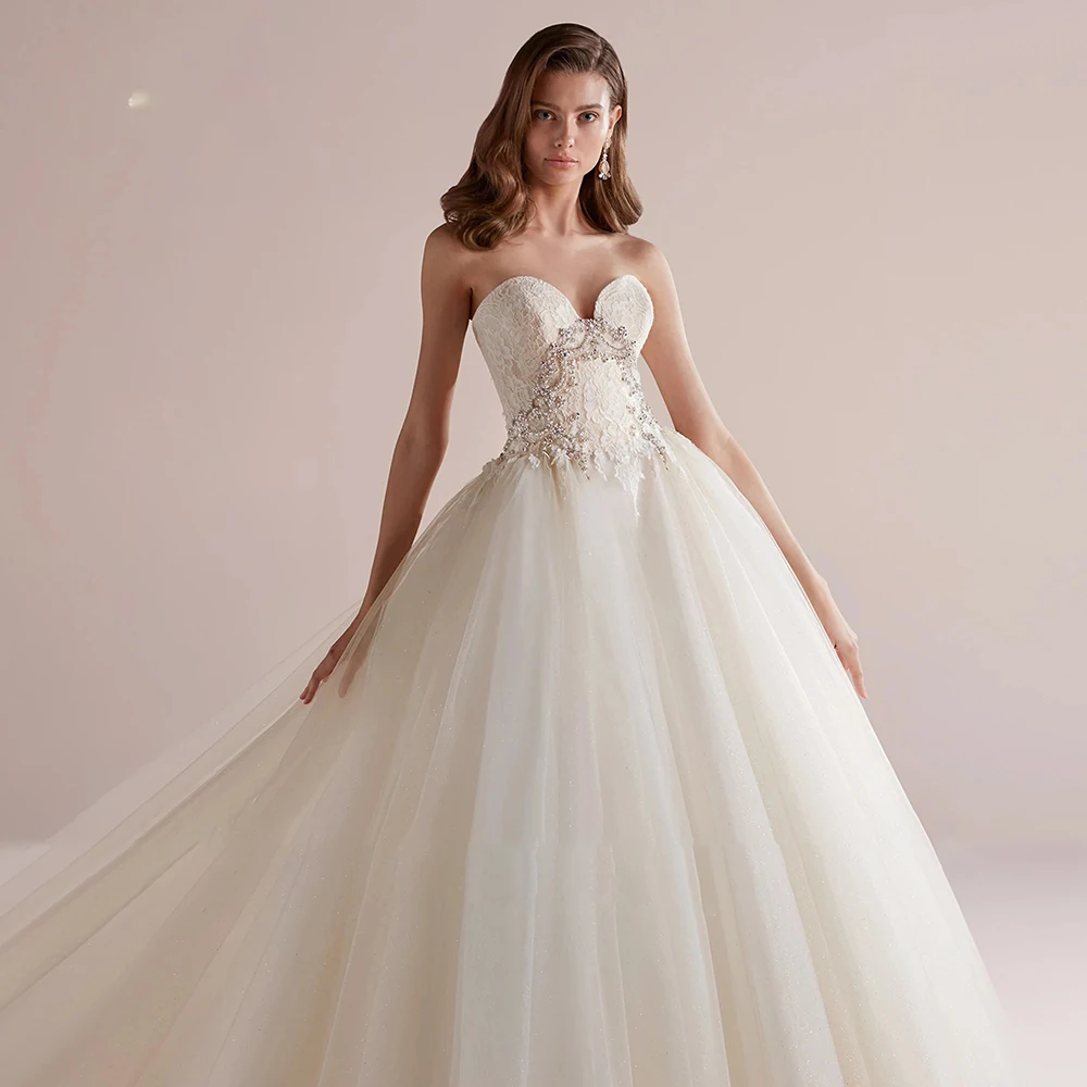 

Sexy A-Line Bridal Gown Strapless Sweetheart Sleeveless Wedding Dress Custom Made Lace Appliques High Quality Dresses