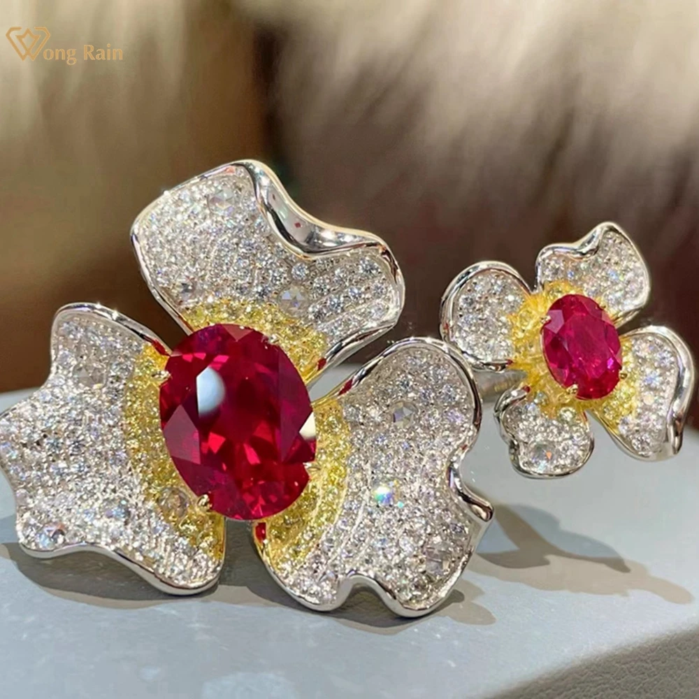 Wong Rain Luxury 925 Sterling Silver Oval Ruby High Carbon Diamond Gemstone Cocktail Party Flower Ring For Women Fine Jewelry