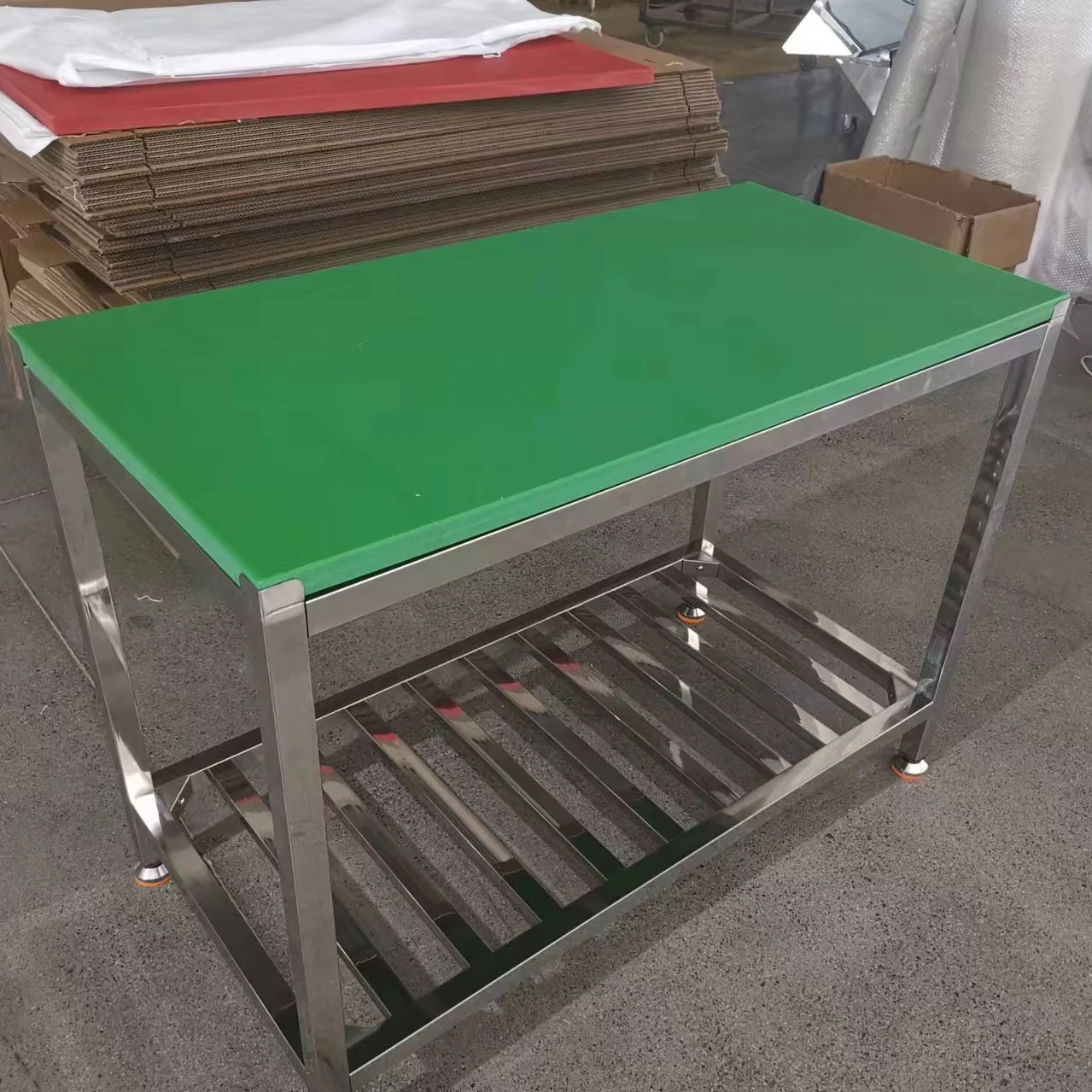 Stainless steel butcher table with poly cutting board food cutting table for hotels and restaurants