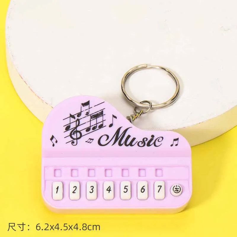 Creative Light-emitting Keychain Toy Simulation Piano Player Music Master Mini Kids Electronic Piano Electronic Game Machine Toy