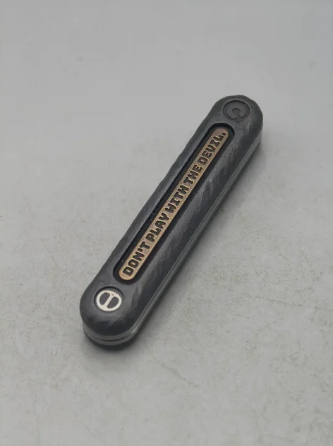 

Used EDC LAUTIE topd dz co named old fried dough stick mechanical push edc metal decompression toys