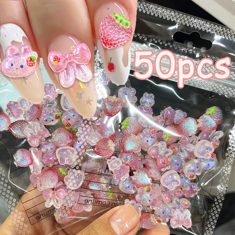 

50pcs/Bag Kawaii Shinny Pink Aurora Cartoon Strawberry Rabbit Nail Art Charms 3D Mixed Cute Bowknot Nail Decoration Manicure Sup
