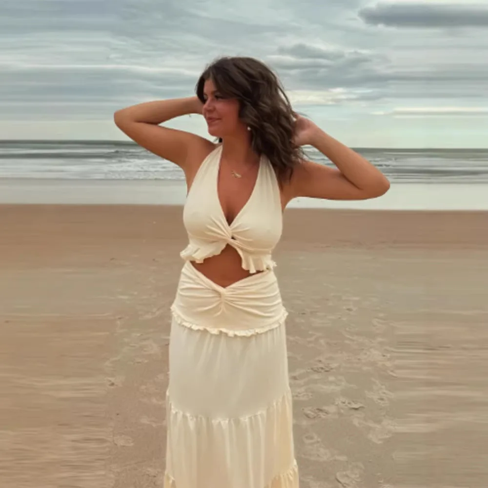 

2026 Spring and Summer Women's Clothing Ruffle Leaf Edge Neck Sling Waist Skirt Set