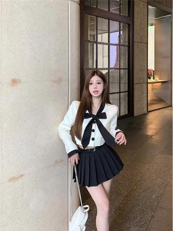 

Новый модный женский костюм-двойка 2026 года: юбка в клетку с завышенной талией и пиджак с бантом в корейском стиле