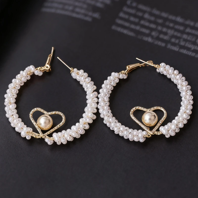 2026 Women's Pearl Hoop Earrings with Gold Color Heart Rotatable Metal Ball in Middle Unique Design White Loop Earrings