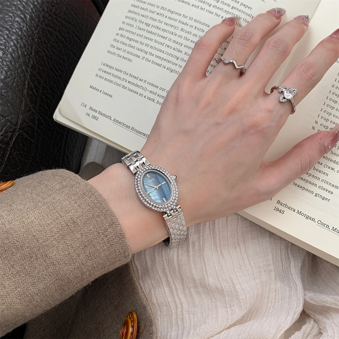 

New 2026 light luxury cold series diamond-encrusted oval four-strip watch women's niche high-end steel belt quartz women's watch