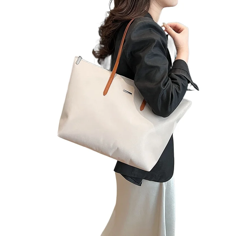 

2025 new large-capacity Japanese handbag casual hit color large-capacity handbag ladies work commuting Tote bags