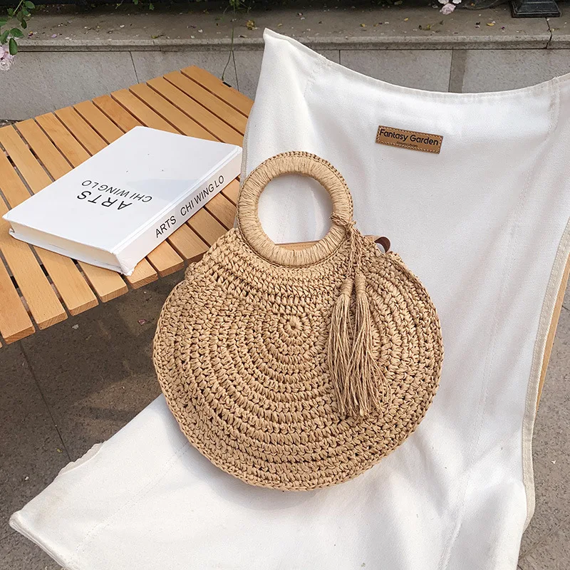 Borse di paglia rotonde da donna estive borsa a tracolla in Rattan borsa da spiaggia intrecciata a mano borse da donna di Design con nappe di grande