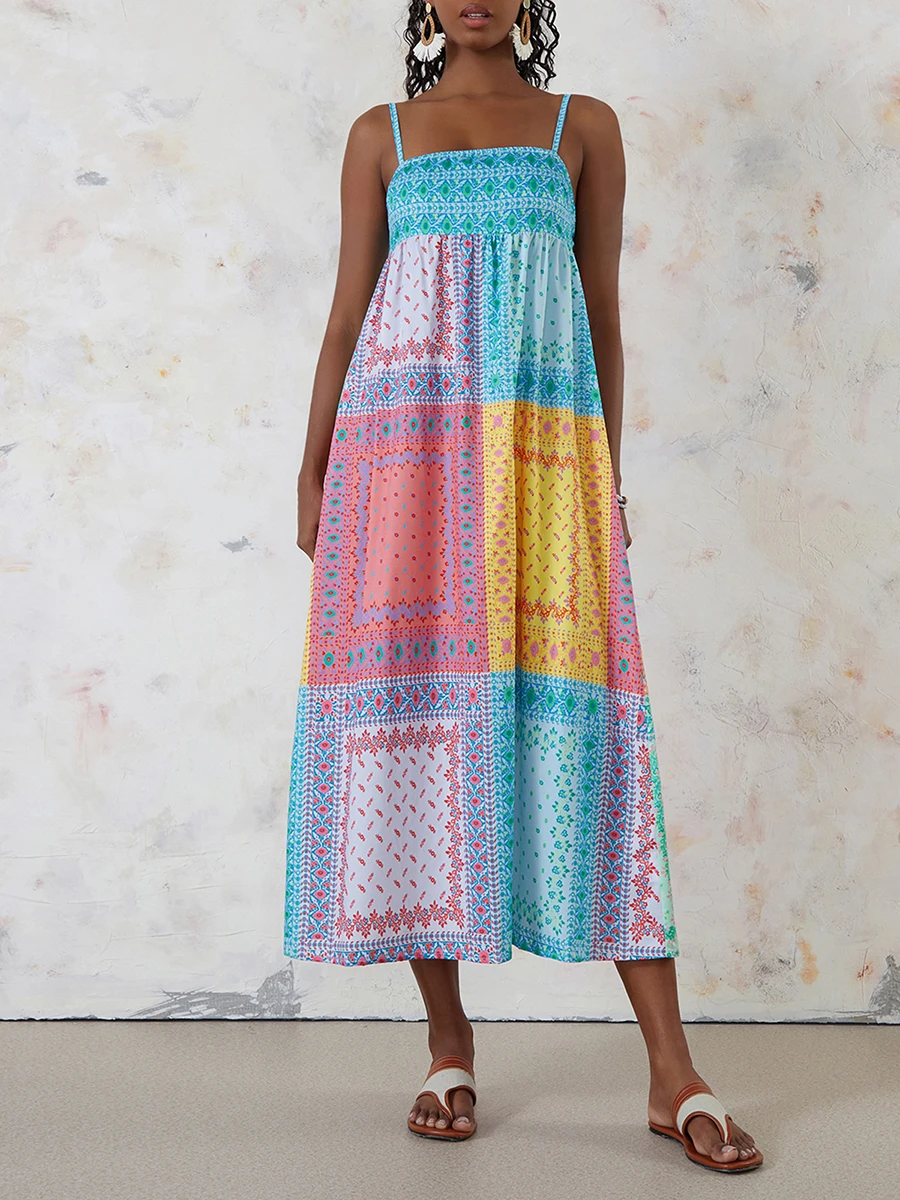 ชุดเดรสยาวโบฮีเมียนของผู้หญิงฤดูร้อนแขนกุดสายสปาเก็ตตี้ขอบพิมพ์ชุดเดรสชายหาด Flowy